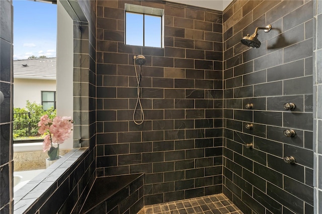 bathroom with tiled shower