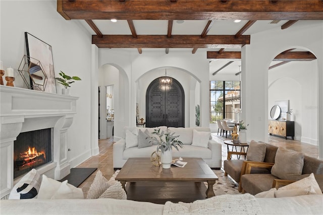 living room featuring beam ceiling