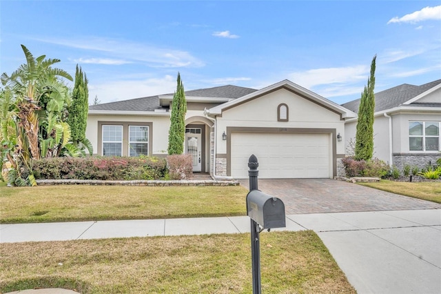 ranch-style house with a front lawn and a garage