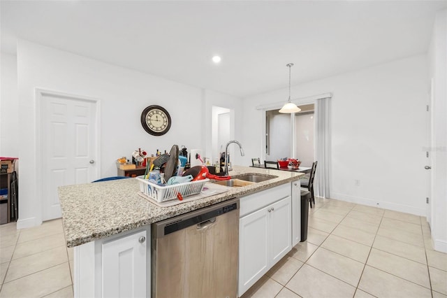 kitchen featuring pendant lighting, sink, dishwasher, white cabinetry, and a kitchen island with sink