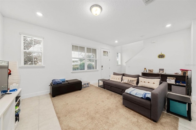 living room featuring tile patterned floors