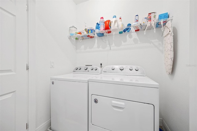 laundry area featuring separate washer and dryer