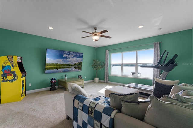 carpeted bedroom featuring ceiling fan