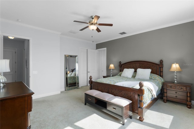 carpeted bedroom with crown molding and ceiling fan