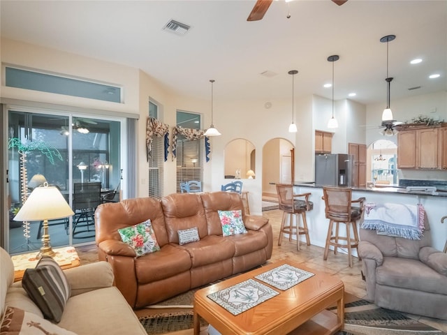 living room featuring ceiling fan