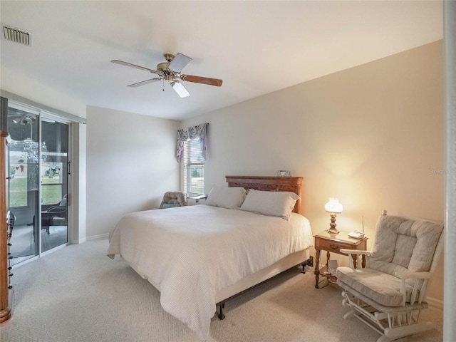 carpeted bedroom featuring ceiling fan and access to exterior