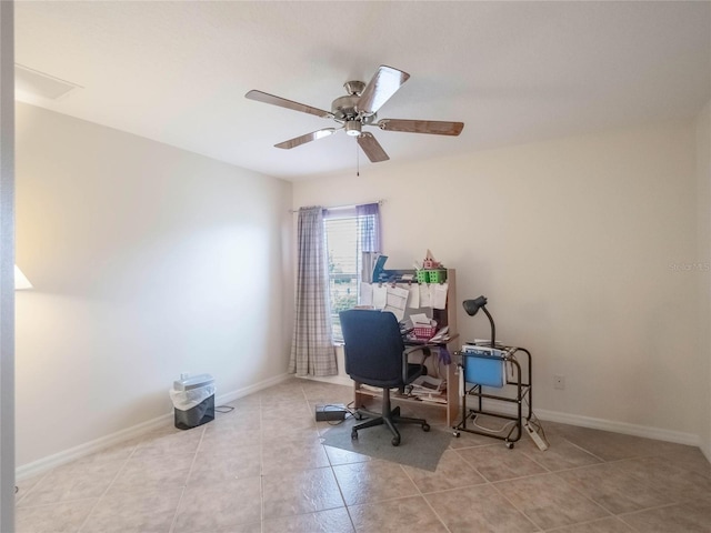 office space with ceiling fan and light tile patterned flooring