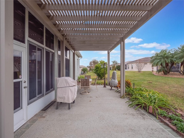 view of patio featuring a pergola and area for grilling