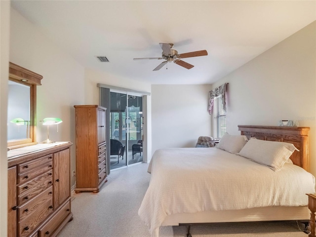 bedroom with ceiling fan, access to exterior, multiple windows, and light carpet