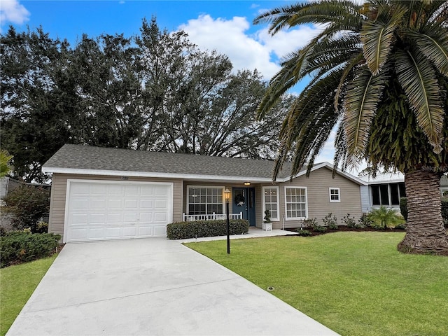 single story home with a garage and a front yard