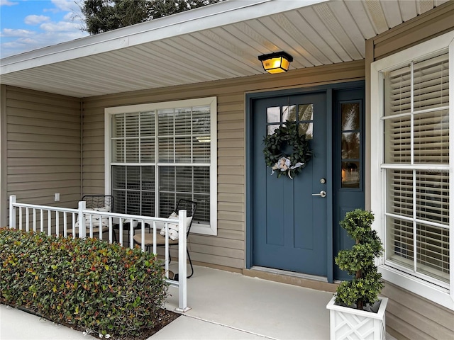 entrance to property with covered porch