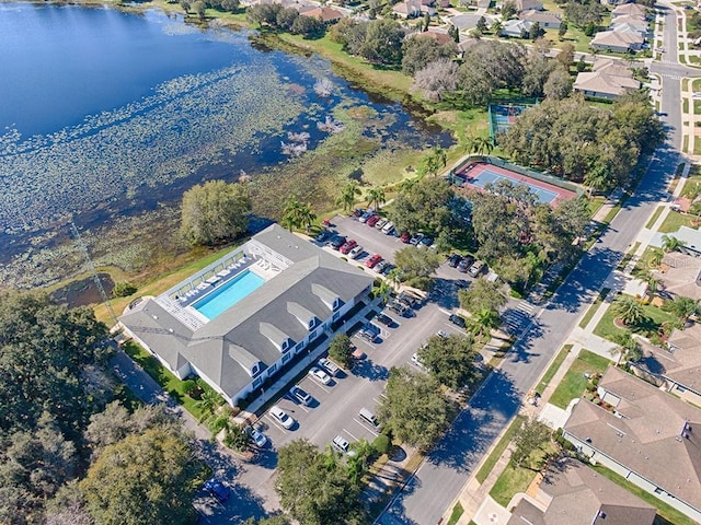 birds eye view of property featuring a water view