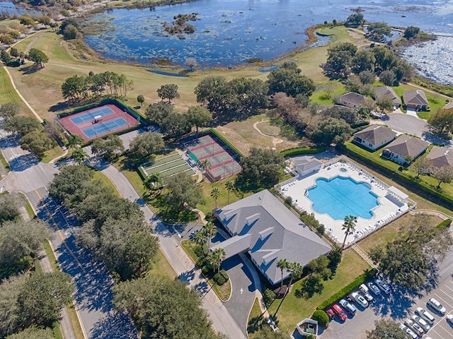 birds eye view of property featuring a water view