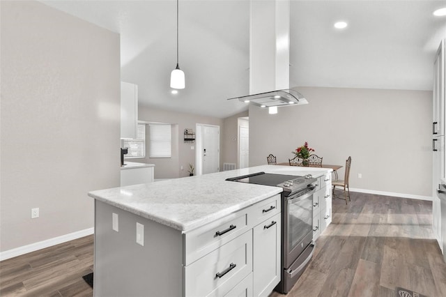 kitchen with white cabinetry, stainless steel electric stove, pendant lighting, light stone counters, and a center island