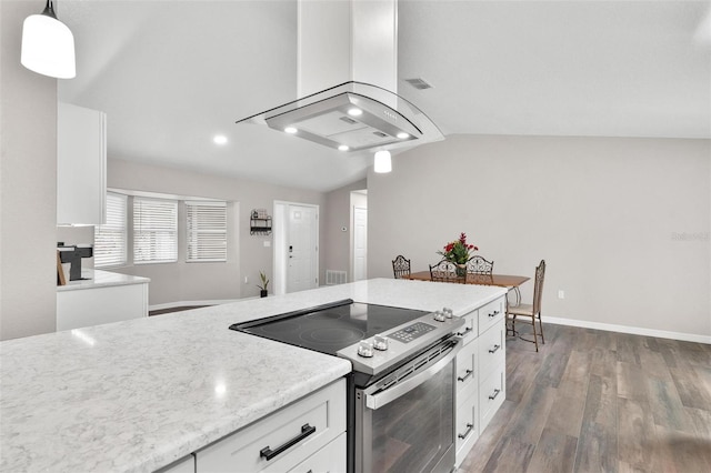 kitchen featuring stainless steel range with electric cooktop, decorative light fixtures, white cabinetry, island exhaust hood, and vaulted ceiling