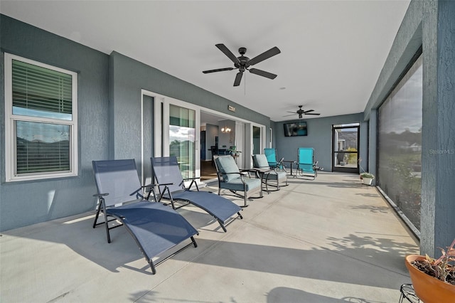 view of patio with ceiling fan