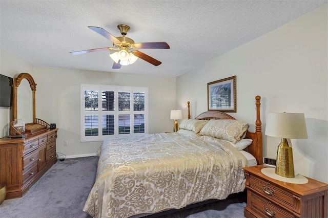 bedroom with dark carpet, a textured ceiling, and ceiling fan