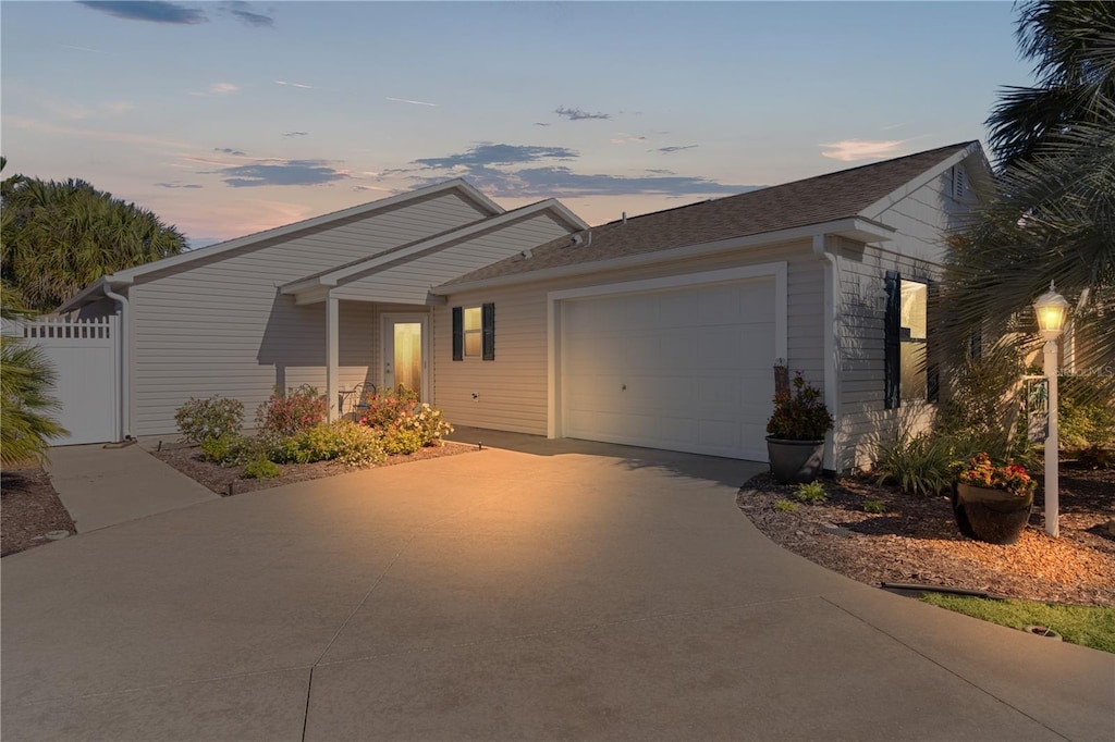 single story home with a garage