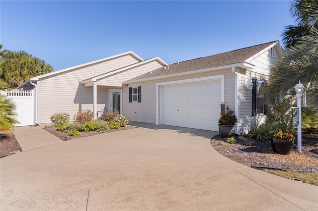 ranch-style house featuring a garage