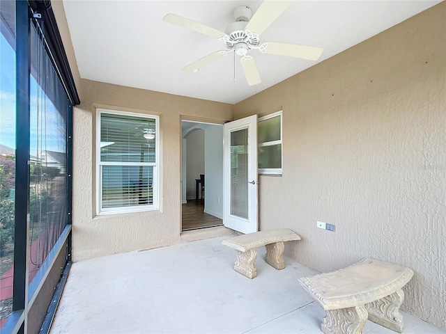 view of patio with ceiling fan