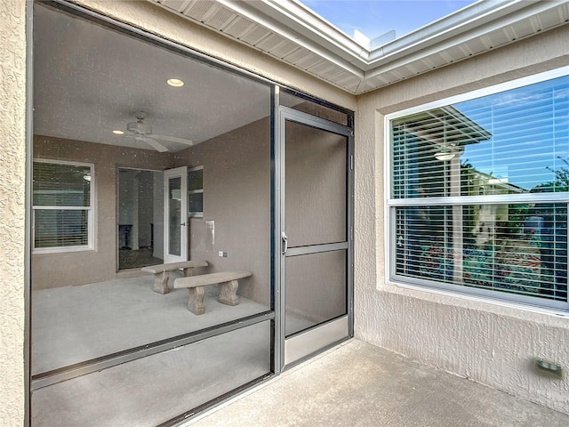 view of patio with ceiling fan