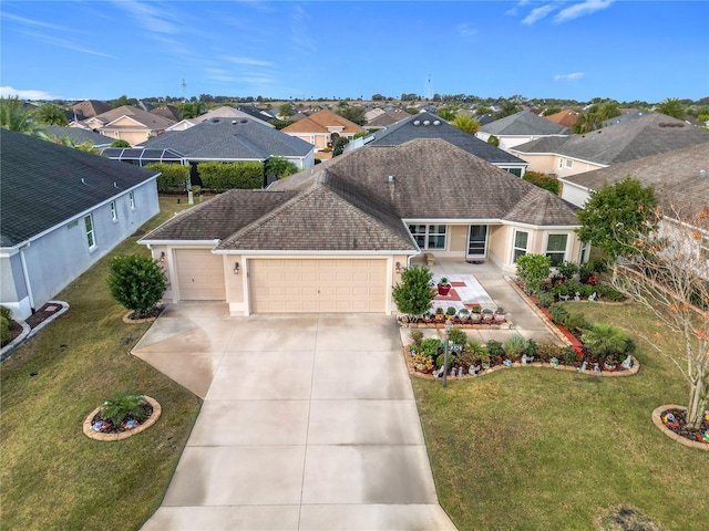 view of front facade featuring a garage and a front yard