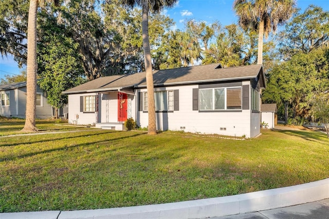 ranch-style house with a front yard