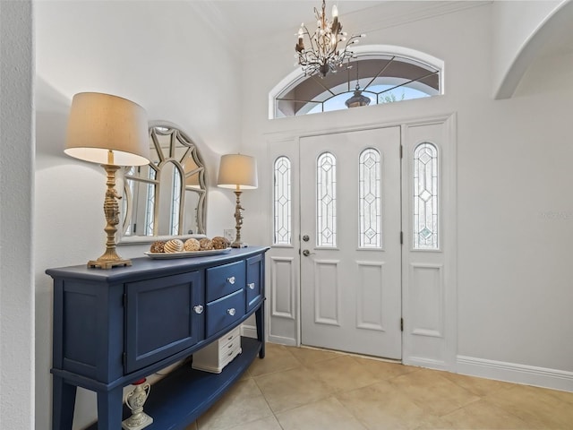 entryway featuring light tile patterned floors and an inviting chandelier