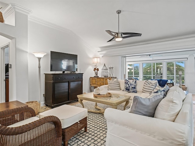 living room with crown molding, ceiling fan, and vaulted ceiling