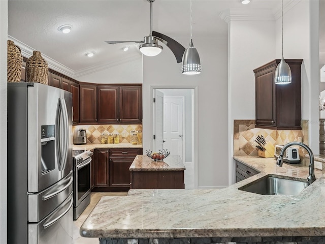 kitchen featuring a kitchen island, sink, decorative backsplash, light stone counters, and stainless steel appliances