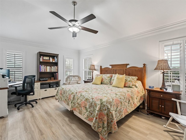 bedroom featuring ornamental molding, ceiling fan, and light hardwood / wood-style floors