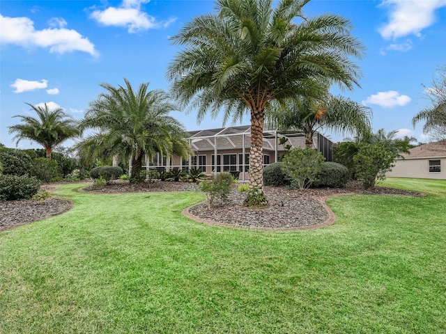 view of yard featuring a lanai