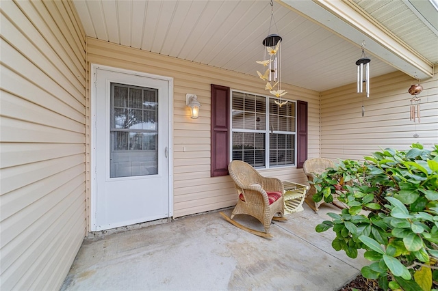 property entrance featuring covered porch