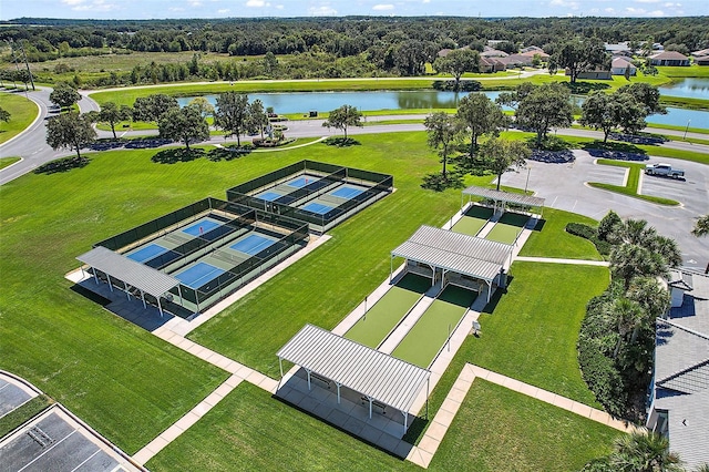 birds eye view of property with a water view