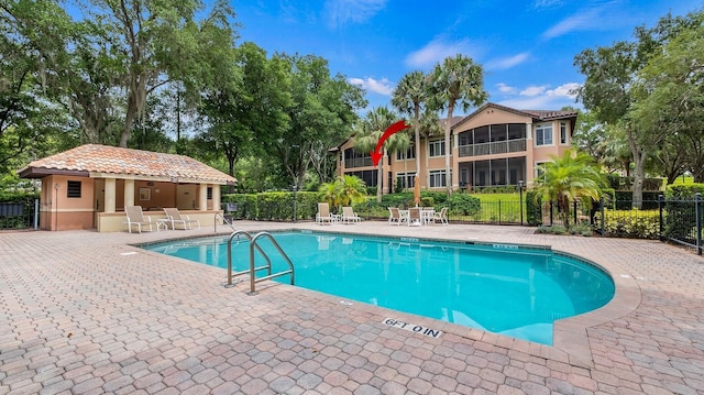 view of pool featuring a patio area