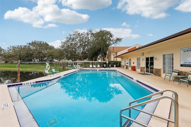 view of pool featuring a patio area