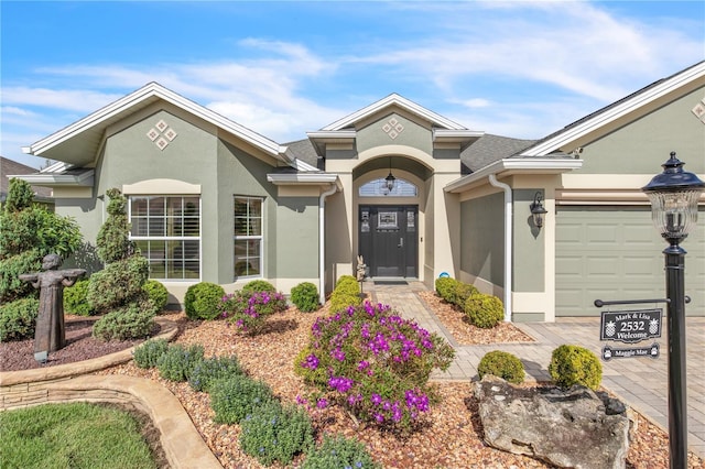 view of front of property with a garage