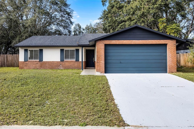 single story home with a front yard and a garage