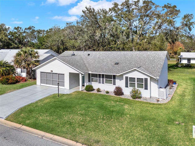 single story home featuring a garage and a front lawn