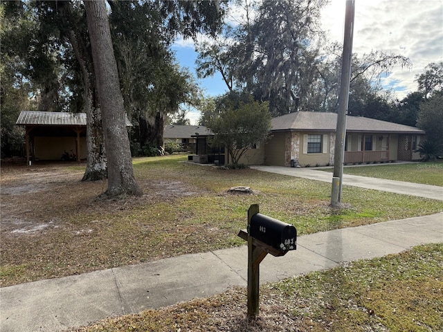 ranch-style house with a front yard