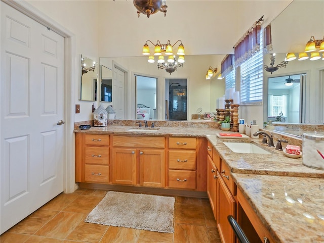 bathroom with vanity and ceiling fan