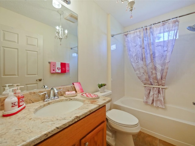 full bathroom featuring toilet, a chandelier, shower / tub combo, vanity, and tile patterned flooring
