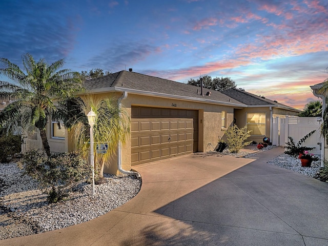 ranch-style home with a garage