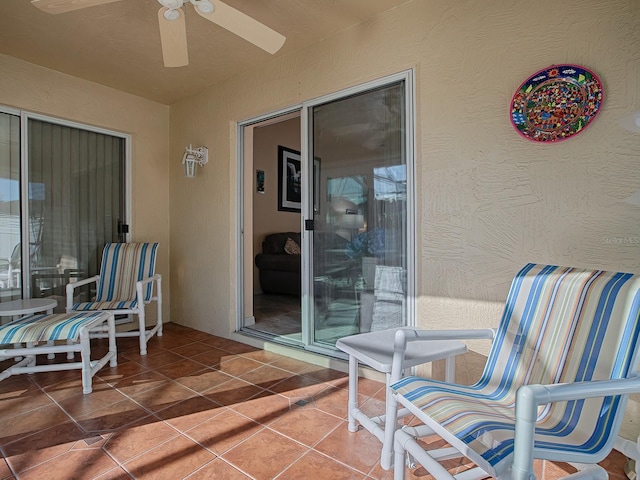 view of patio / terrace featuring ceiling fan