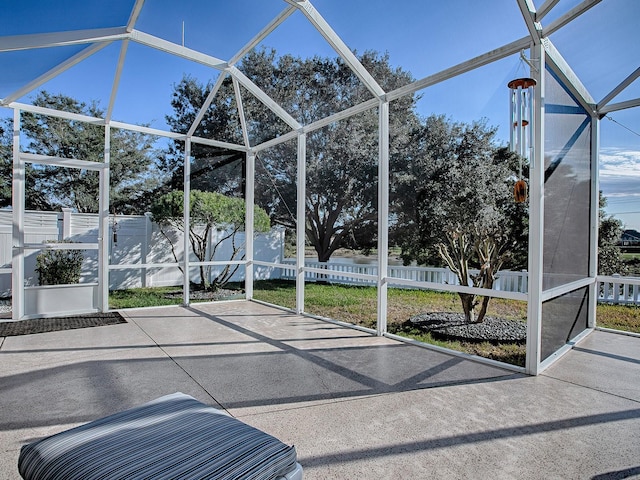 unfurnished sunroom with a swimming pool