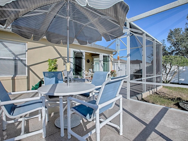 view of patio / terrace with a lanai