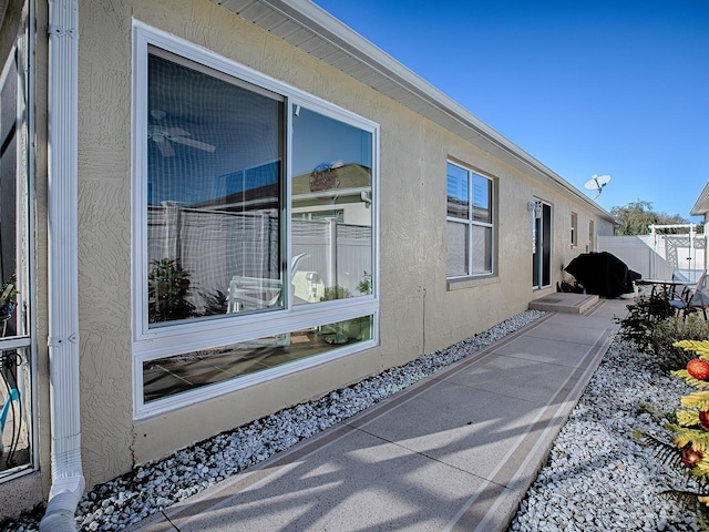 view of home's exterior featuring a patio