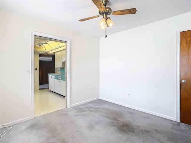 unfurnished room featuring ceiling fan