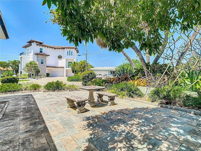 view of patio / terrace with a garage