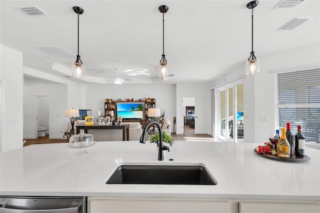 5857 Mackenzie Ave, The Villages, FL 32163 - kitchen featuring open floor plan, a sink, visible vents, dishwasher, and ceiling fan